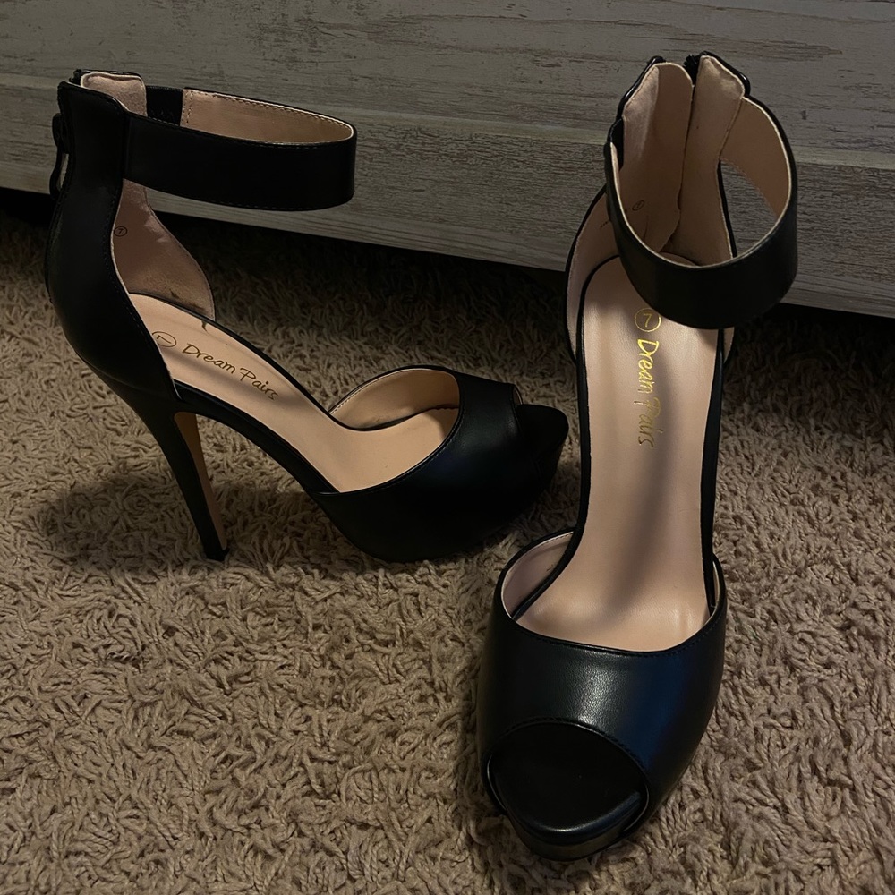 gently worn black high heels